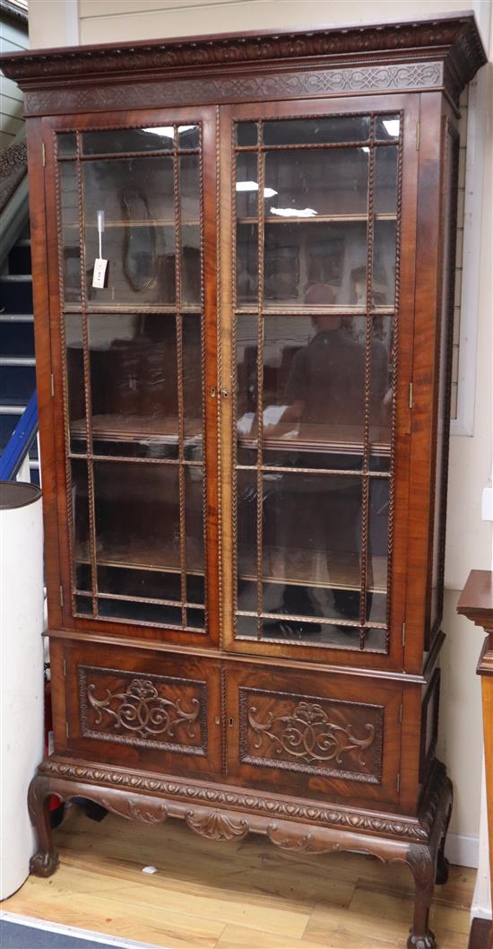 A 1920s Chippendale revival mahogany bookcase W.112cm